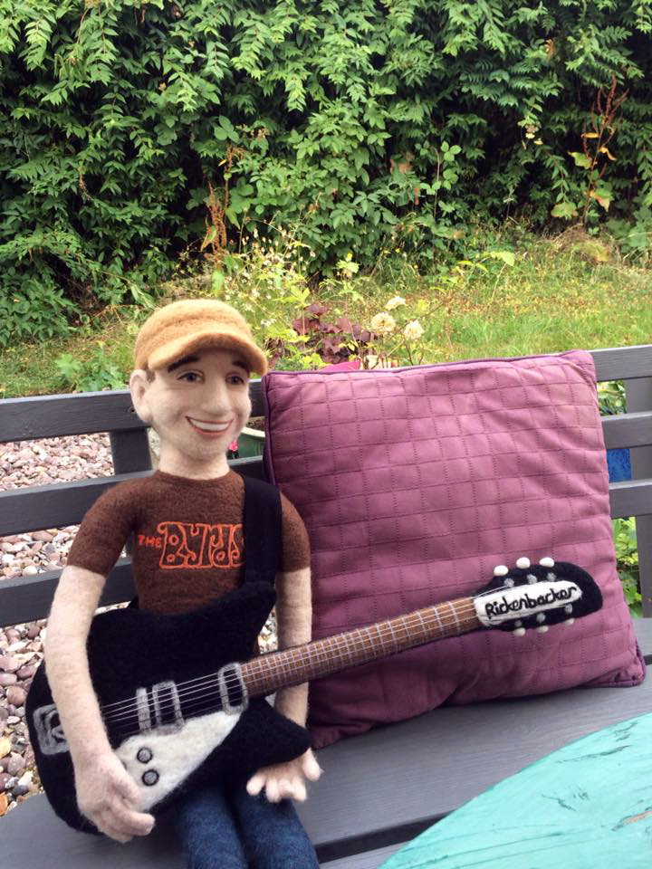 A commission piece - Fun of the Pier part time band member Richard Snow playing his Rickenbacker guitar. The piece is made from needle felted wool and is about two feet tall.